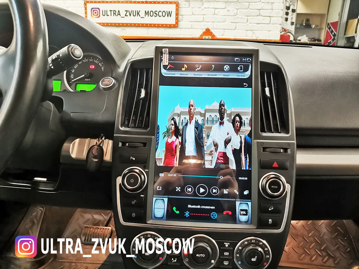 Магнитола в стиле. Магнитола CARMEDIA 7019. Магнитола Freelander 2 Android. Freelander 2 магнитола в стиле Тесла. Магнитола черная с кнопками.